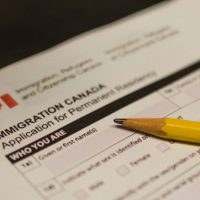 A fake Canada immigration application form kept with pencil